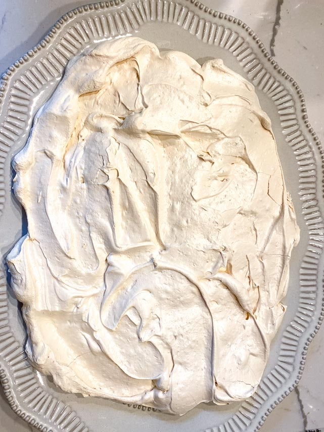 slab pavolva meringue disc on large serving platter