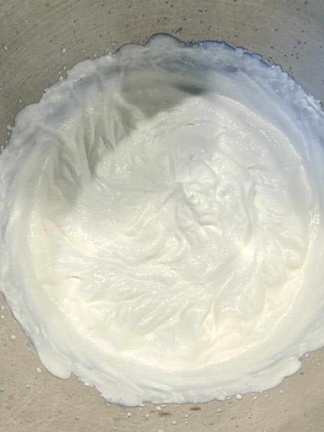 softly whipped cream in bowl