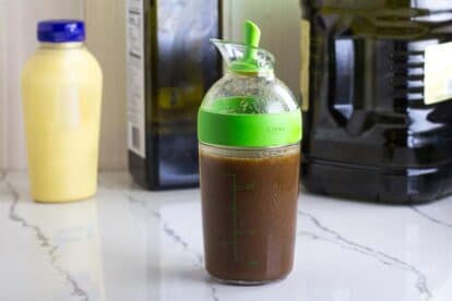 Balsamic vinaigrette in small carafe with spout