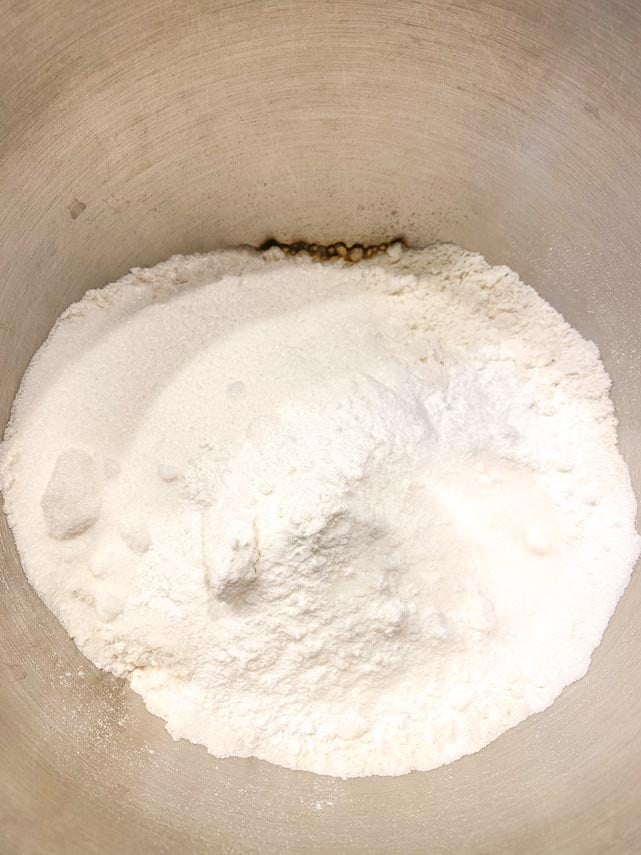 dry ingredients for fluffy pancakes in mixing bowl