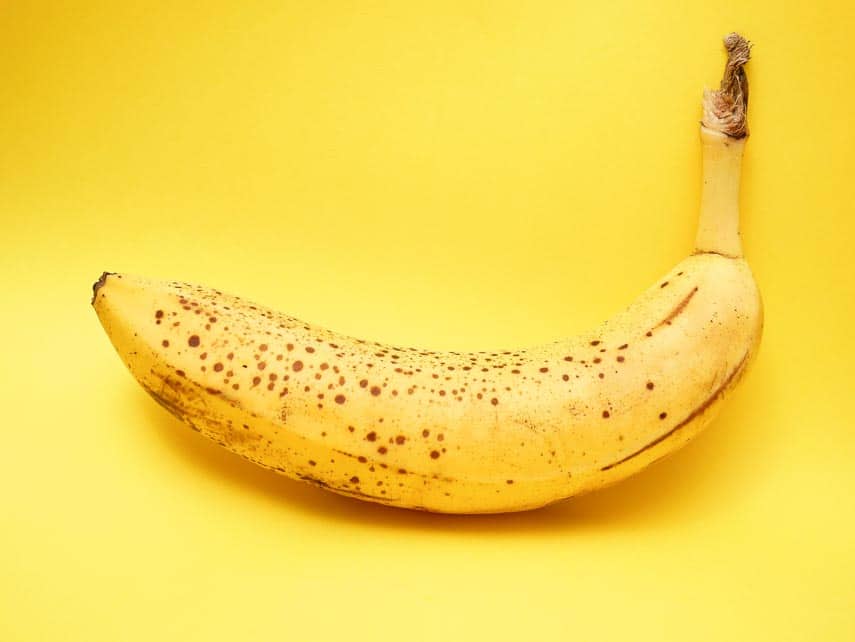 ripe banana with black spots