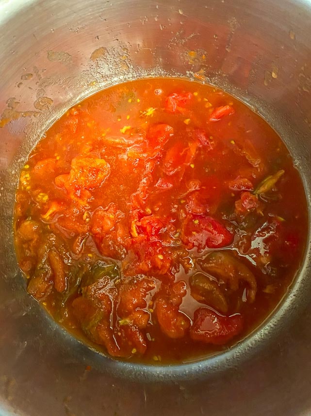 tomatoes peeled, chopped, in pot