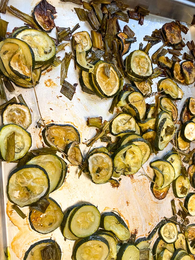 zucchini and scallion greens roasted on sheet pan