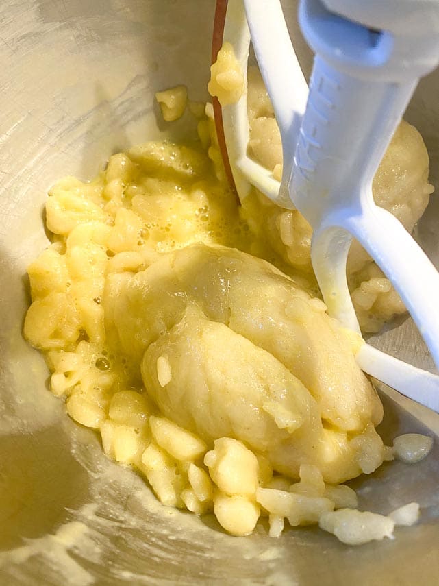 adding egg to pate a choux dough in mixer; egg is resisting becomming incorporated