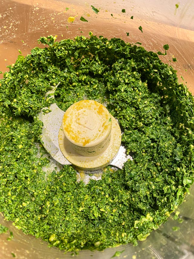 ingredients for kale pesto in food processor finely chopped