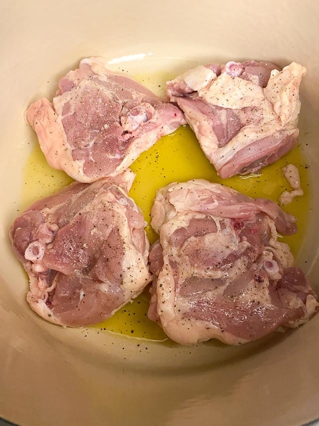 browning-chicken-thighs-skin-side-down-in-Dutch-oven