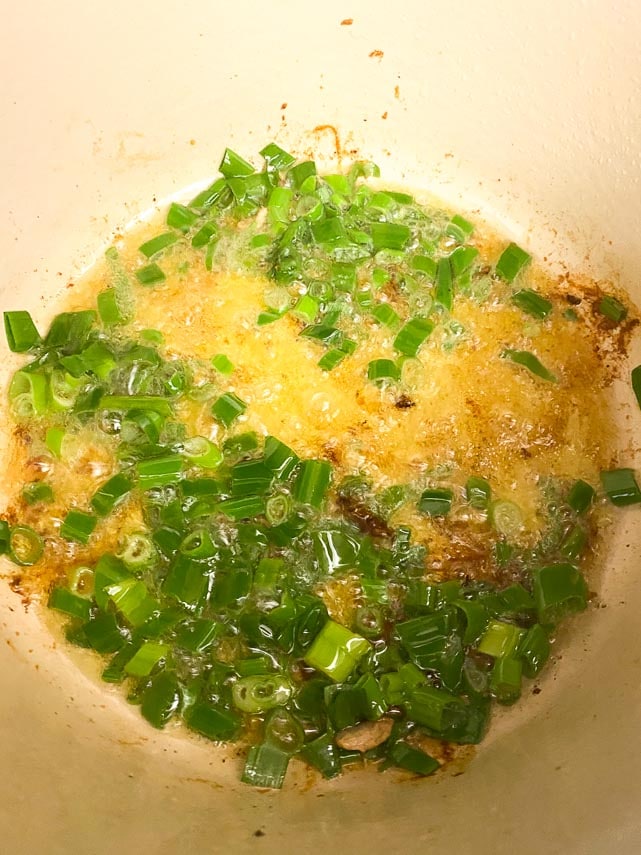 sauteeing-scallion-greens-in-olive-oil-in-Dutch-oven