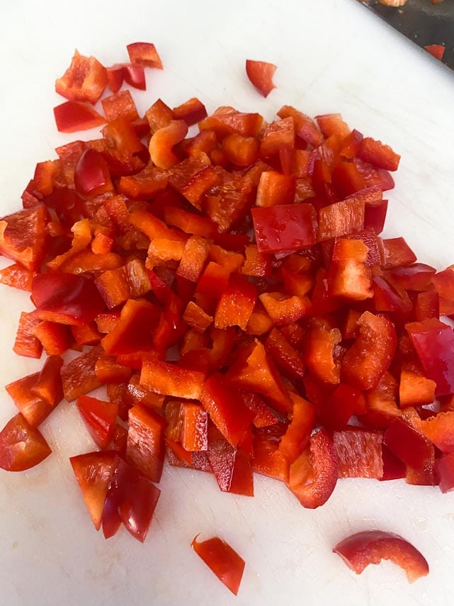 chopped-red-pepper-on-white-board