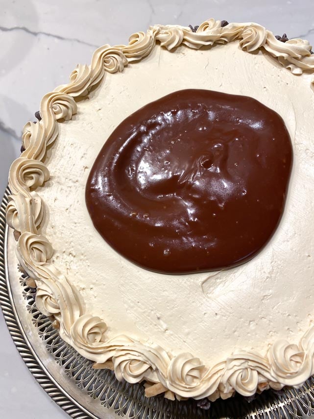 ganache-poured-on-top-of-frosted-cake_