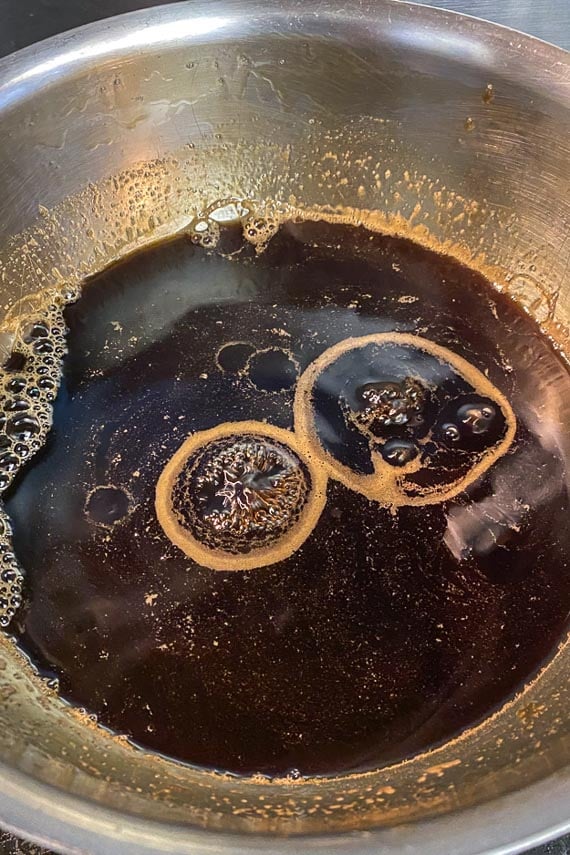 gently-simmering-coffee-liqueur-mixture-in-pan