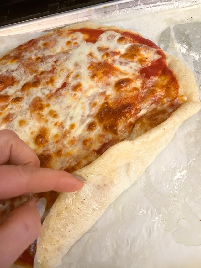 Pizza not baked twice with a bottom that is not browned enough