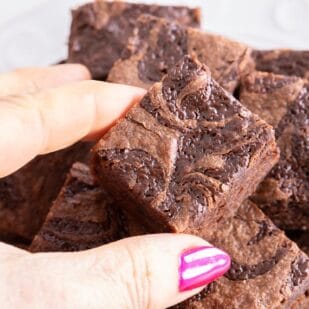 close up of a low FODMAP Nutella Brownies held in hand