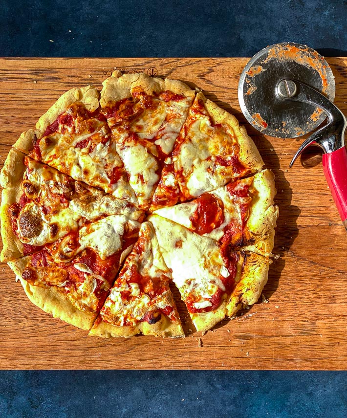 Caputo Fioreglut Gluten-Free Low FODMAP Pizza on board sliced into wedges