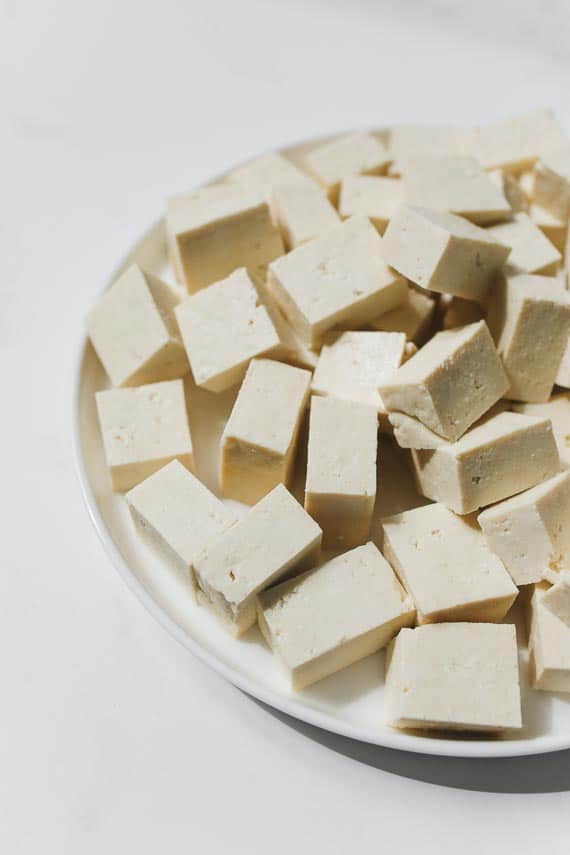 cubed tofu on white plate_