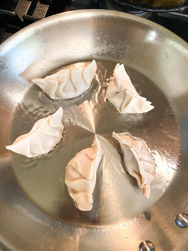 pan searing pork dumplings