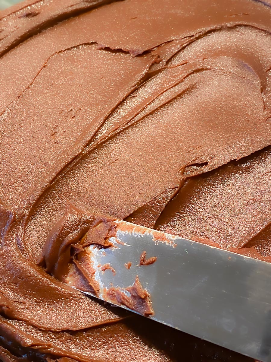 close up of espresso frosting on cake