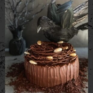 main image of Low FODMAP Chocolate Cake with Mocha Frosting, decorated for Halloween