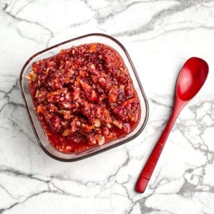 overhead low FODMAP Raw Cranberry Relish in square glass bowl