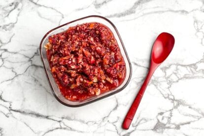 overhead low FODMAP Raw Cranberry Relish in square glass bowl