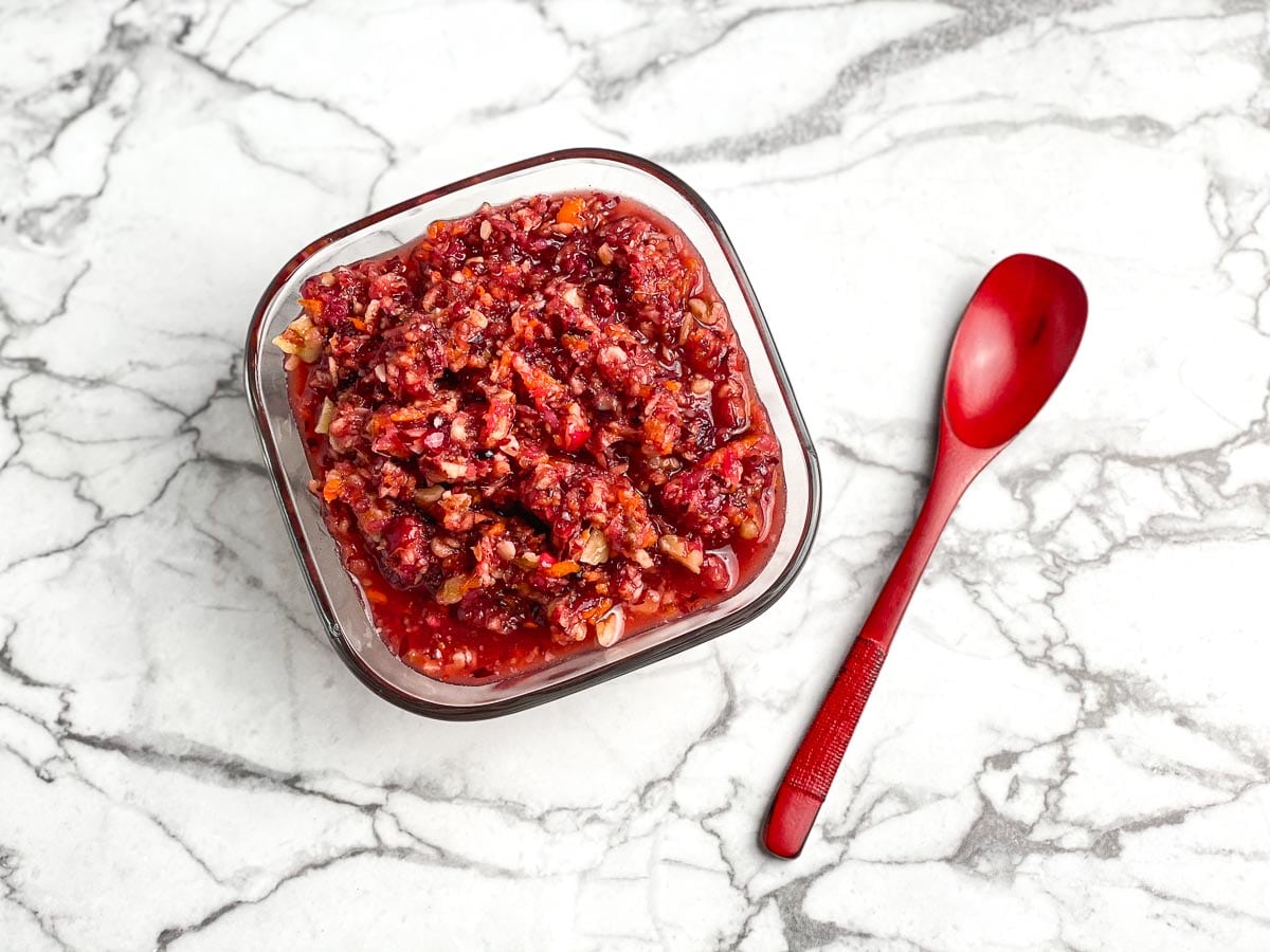 overhead low FODMAP Raw Cranberry Relish in square glass bowl