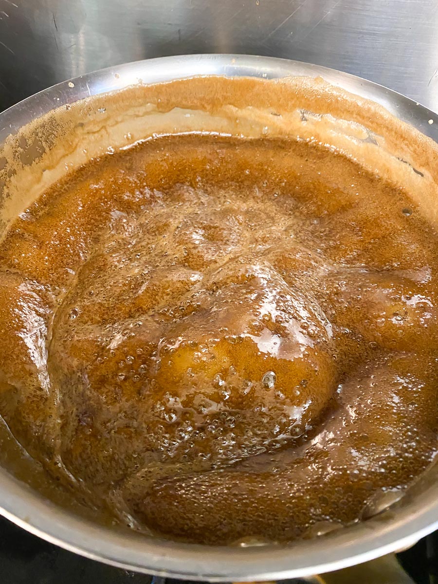 coffee liqueur and sugar boiling in pot