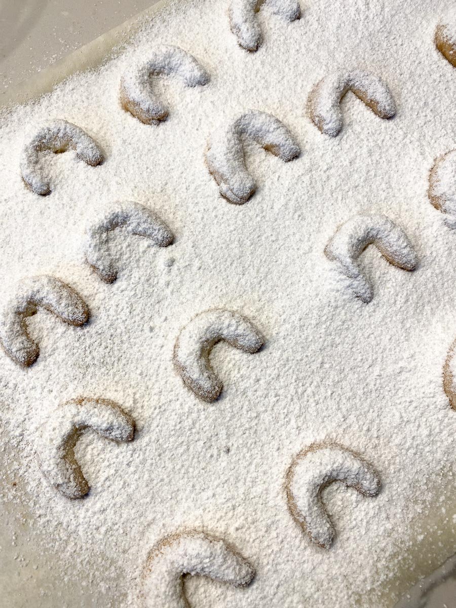 sugar coated Low FODMAP Vanilla Crescents on pan