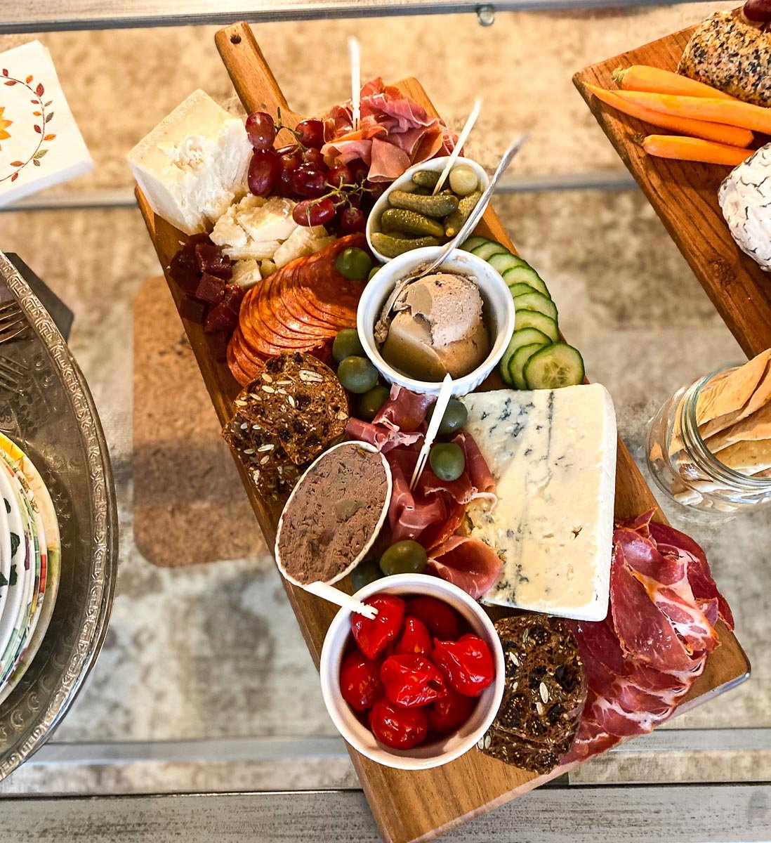 another view of Low FODMAP Charcuterie and Cheese board on coffee table