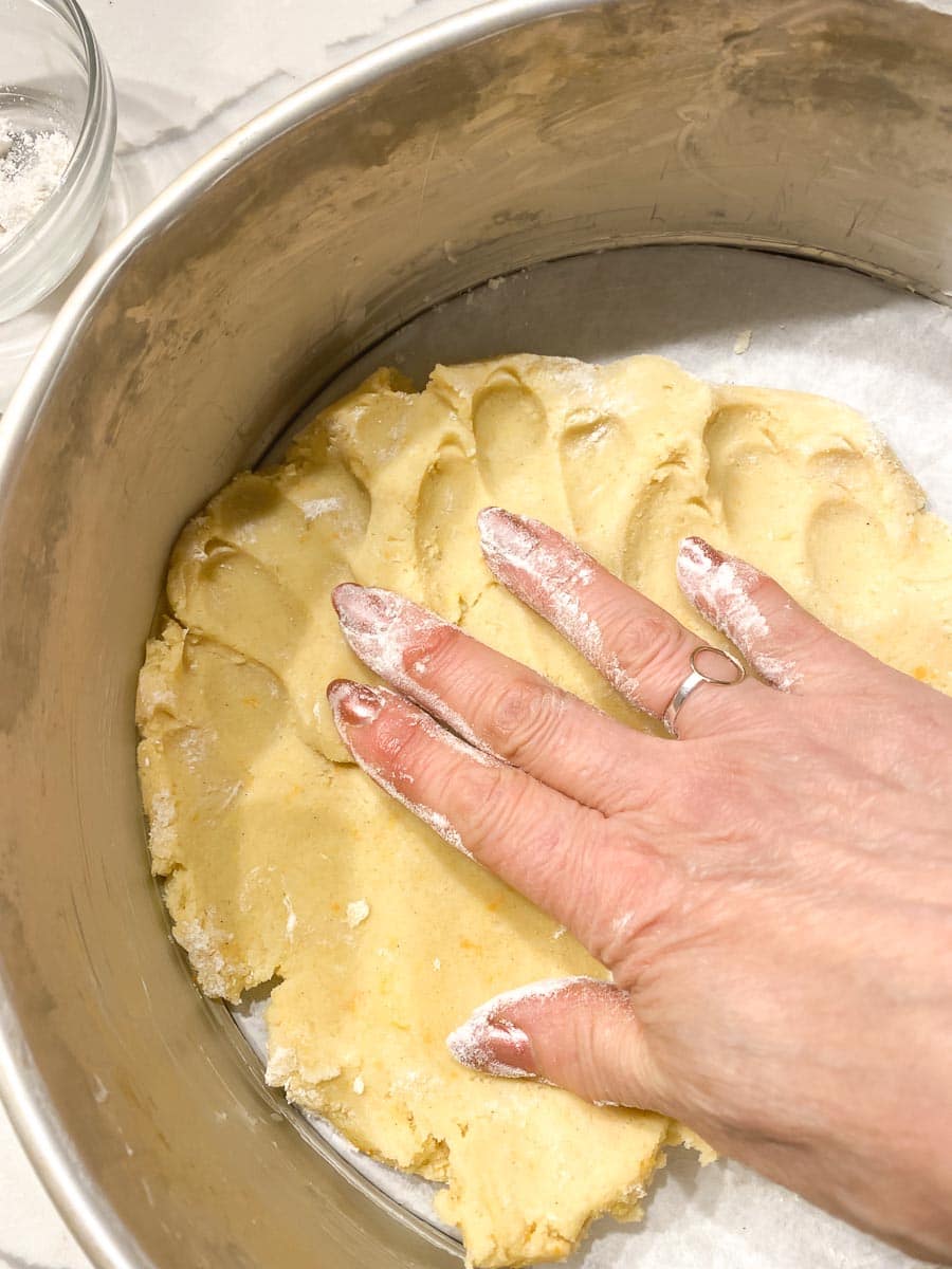 patting crust in springform pan