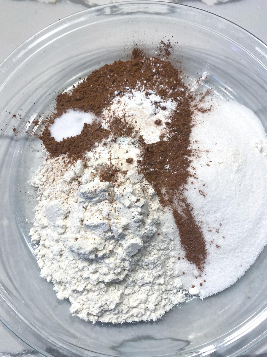 dry ingredients for chocolate pudding cake in a bowl
