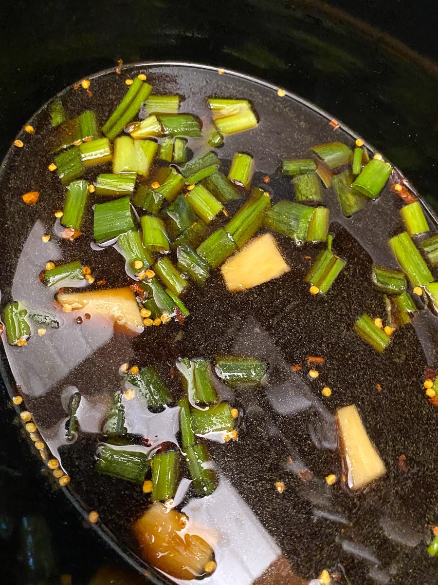 soy sauce, ginger and scallion greens in slow cooker