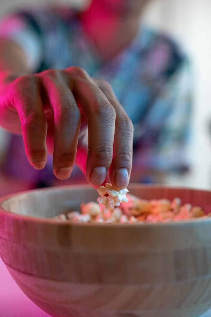 man eating popcorn