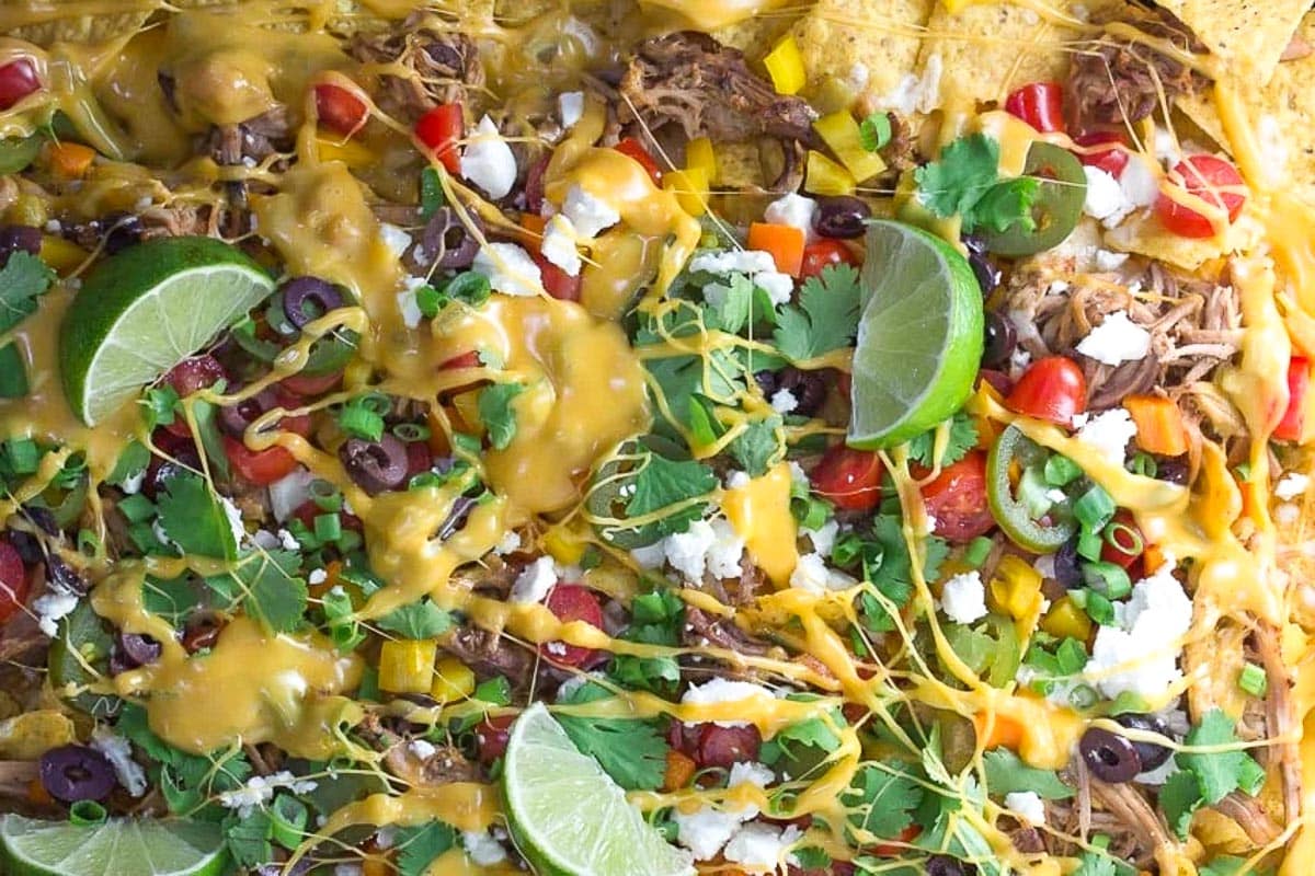 Slow-Cooked-Pork-Nachos-with-3-Cheese-Beer-Queso.