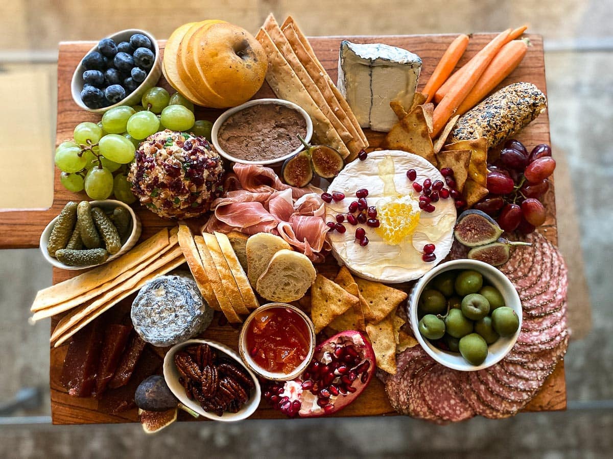 close-image-of-Low-FODMAP-Charcuterie-and-Cheese-board-on-coffee-table.
