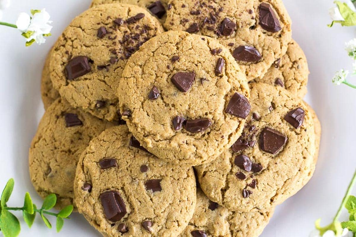 overhead-image-of-Low-FODMAP-Chewy-Peanut-Butter-Chocolate-Chunk-Cookies-on-white-plate.