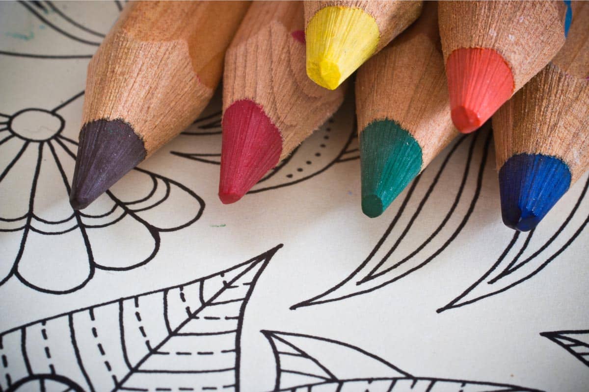 coloring book and pencils.