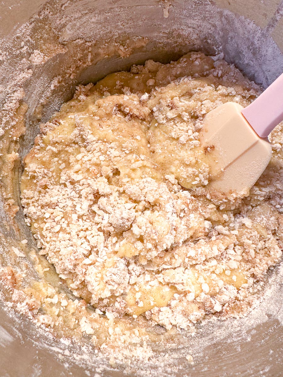 folding dry mixture into wet batter in bowl.