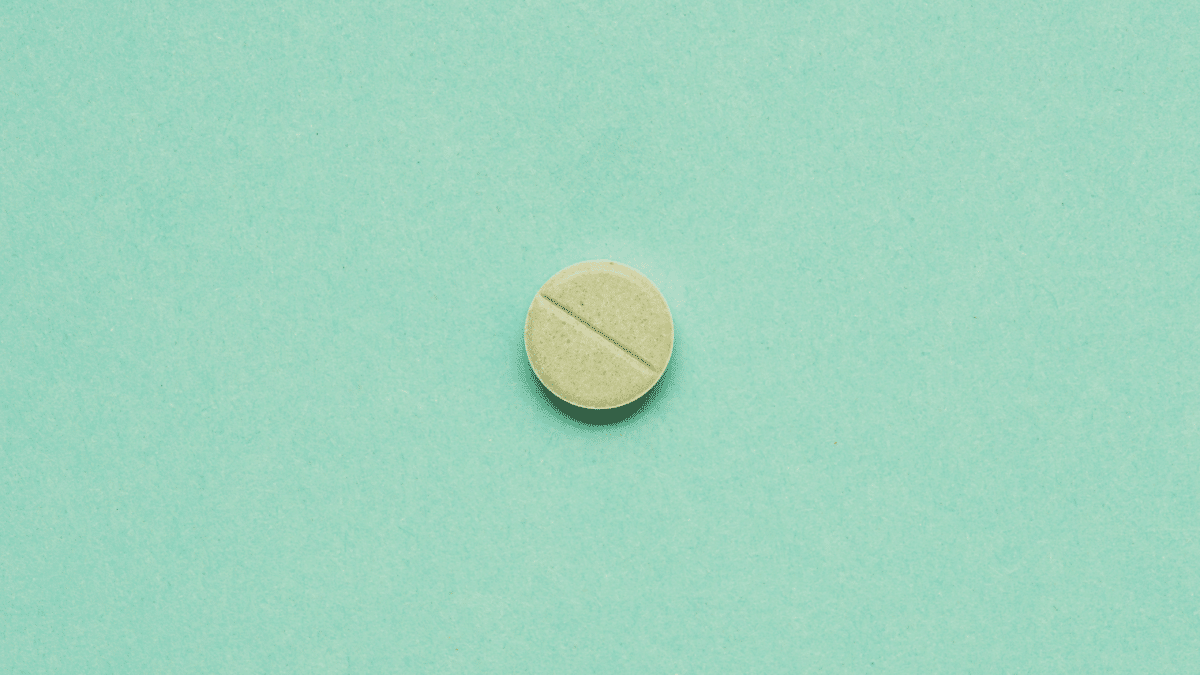 pill on green background