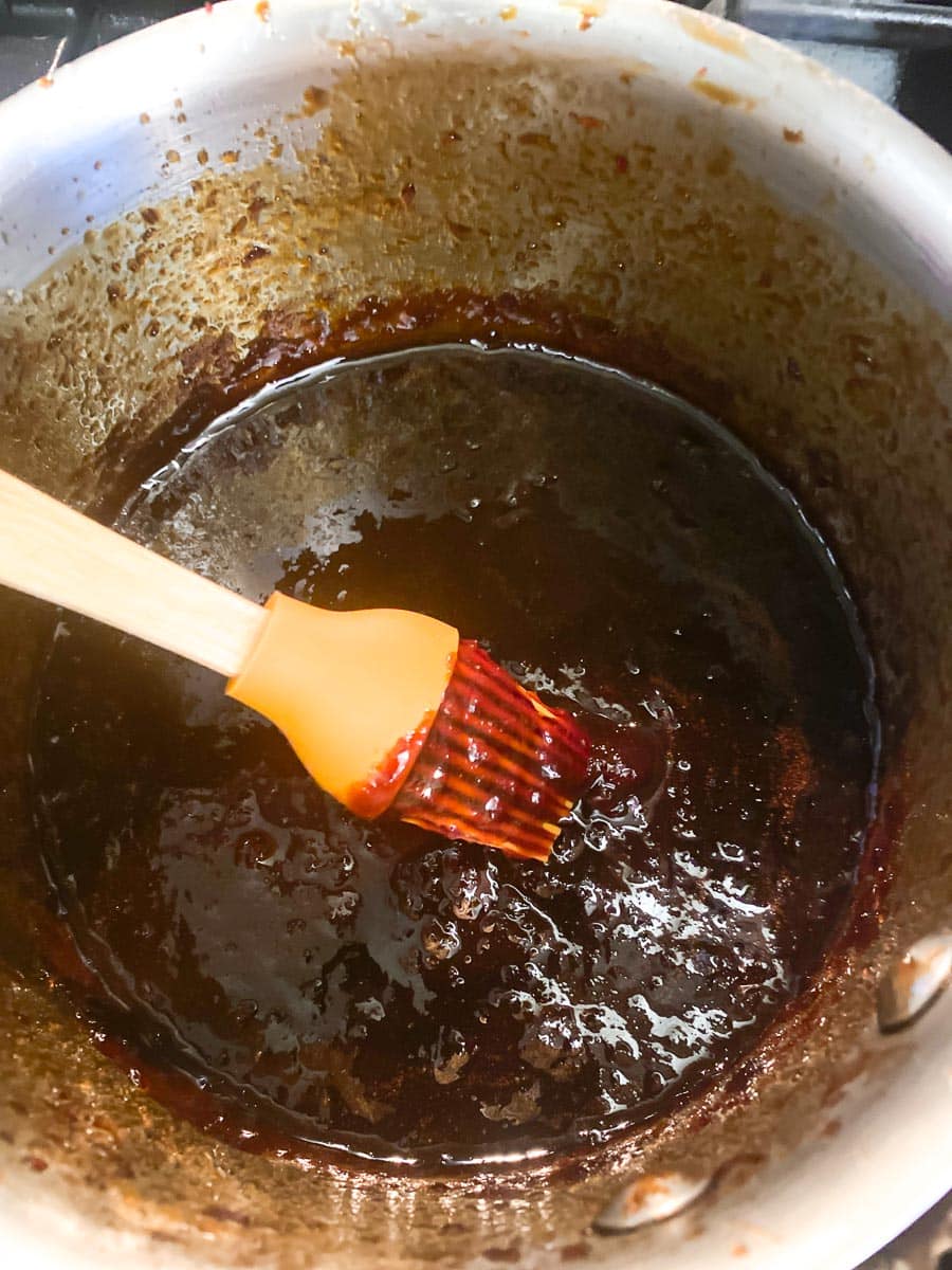 plum sauce cooking in pan.