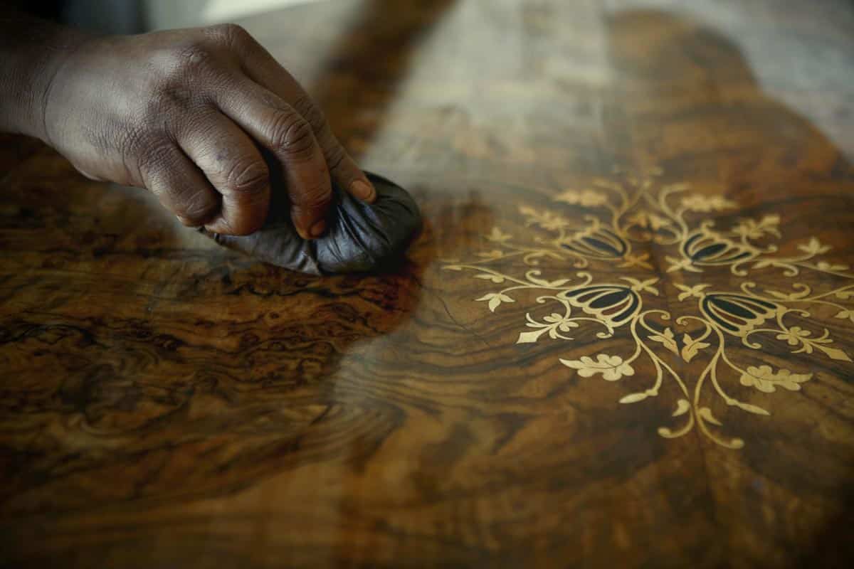 polishing wood table.