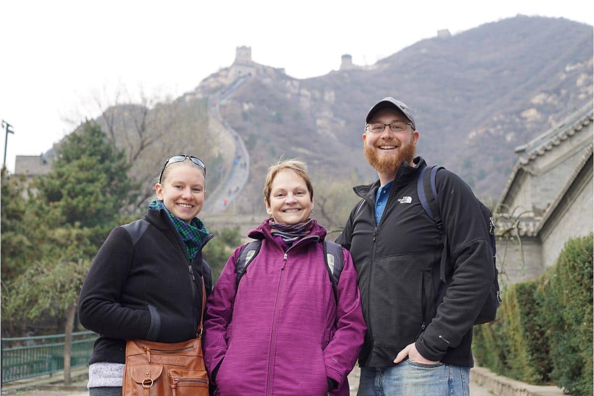 three people together outside.