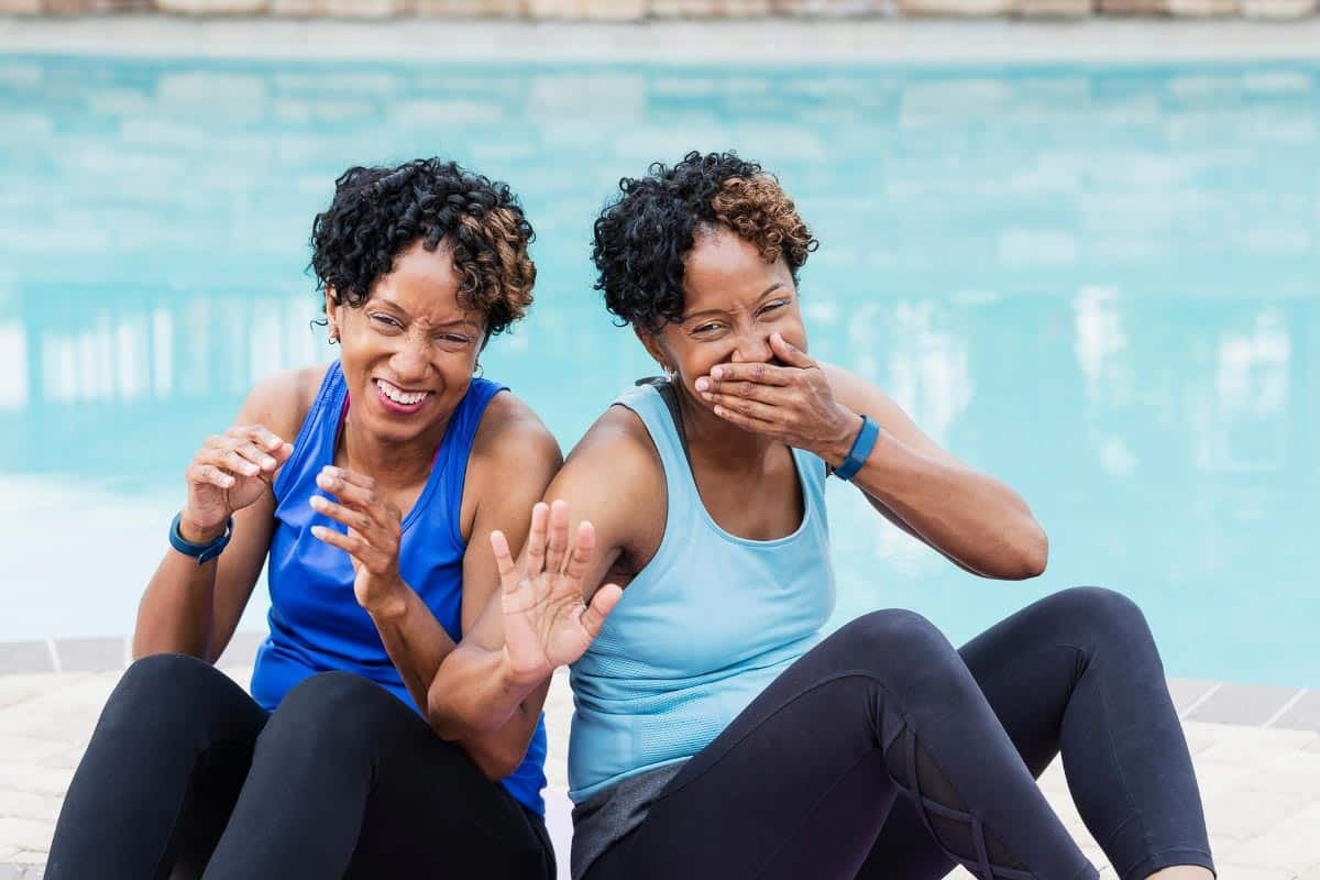 women laughing.