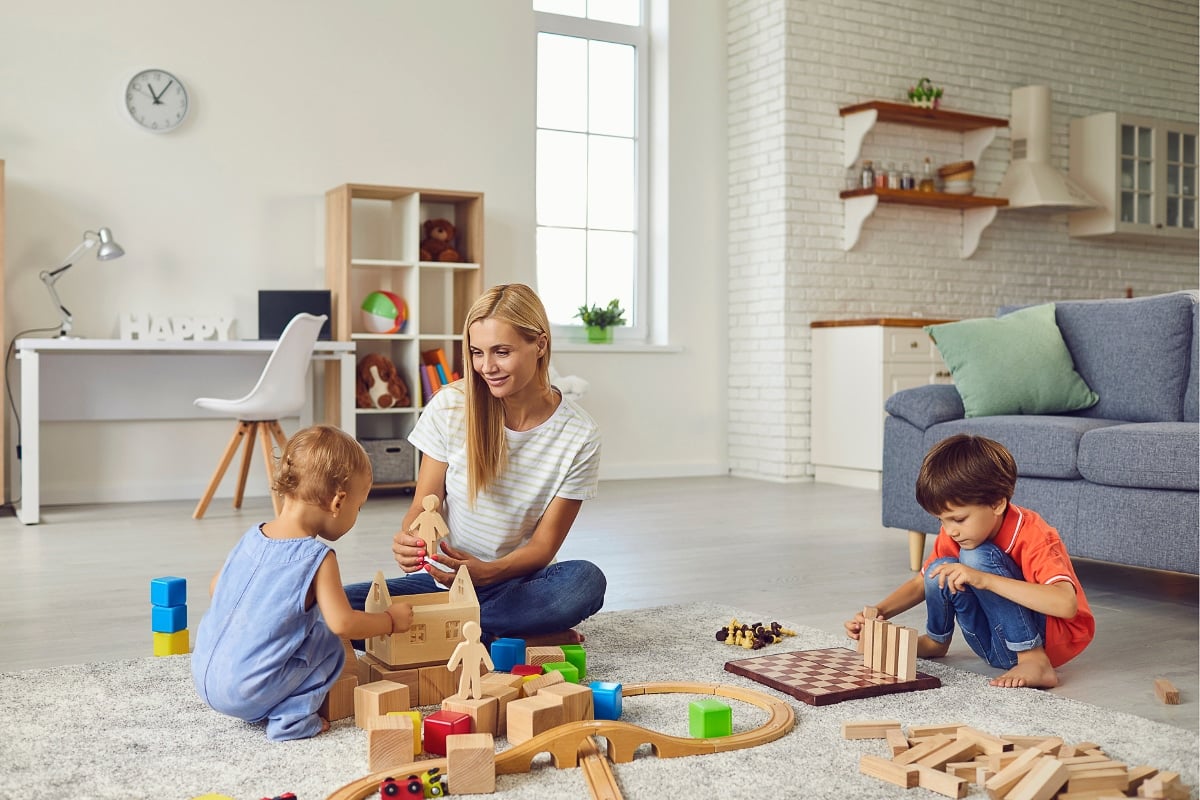 Mom playing with kids.