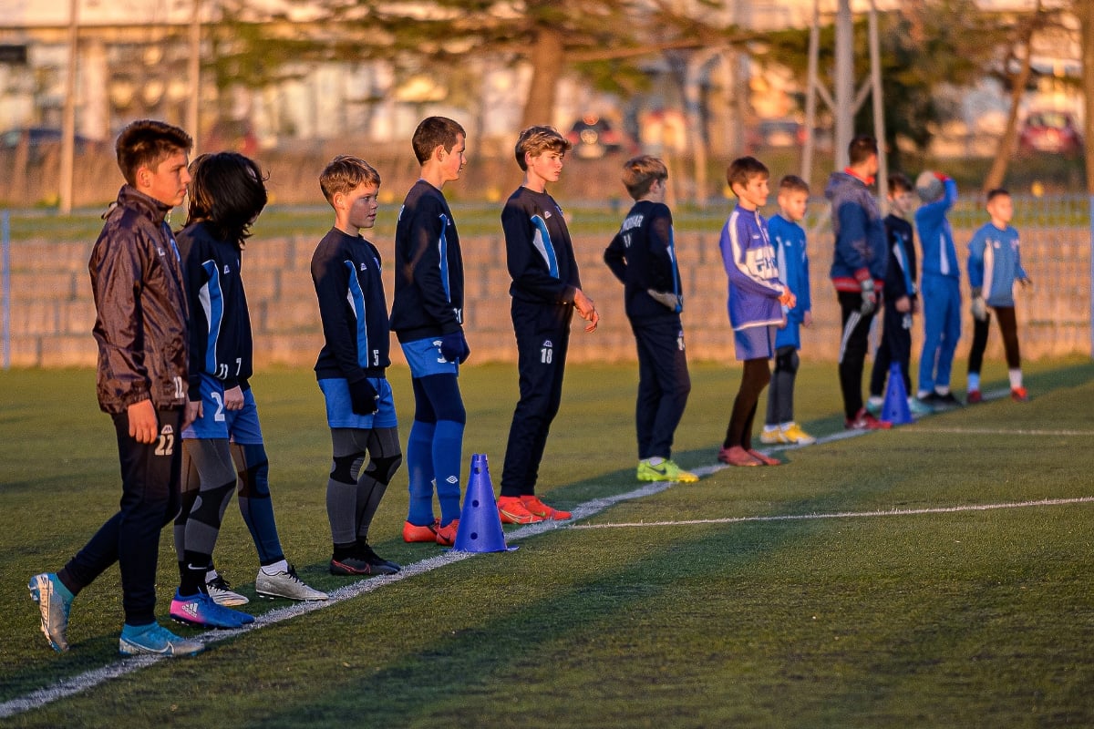 kids lined up for team sport.