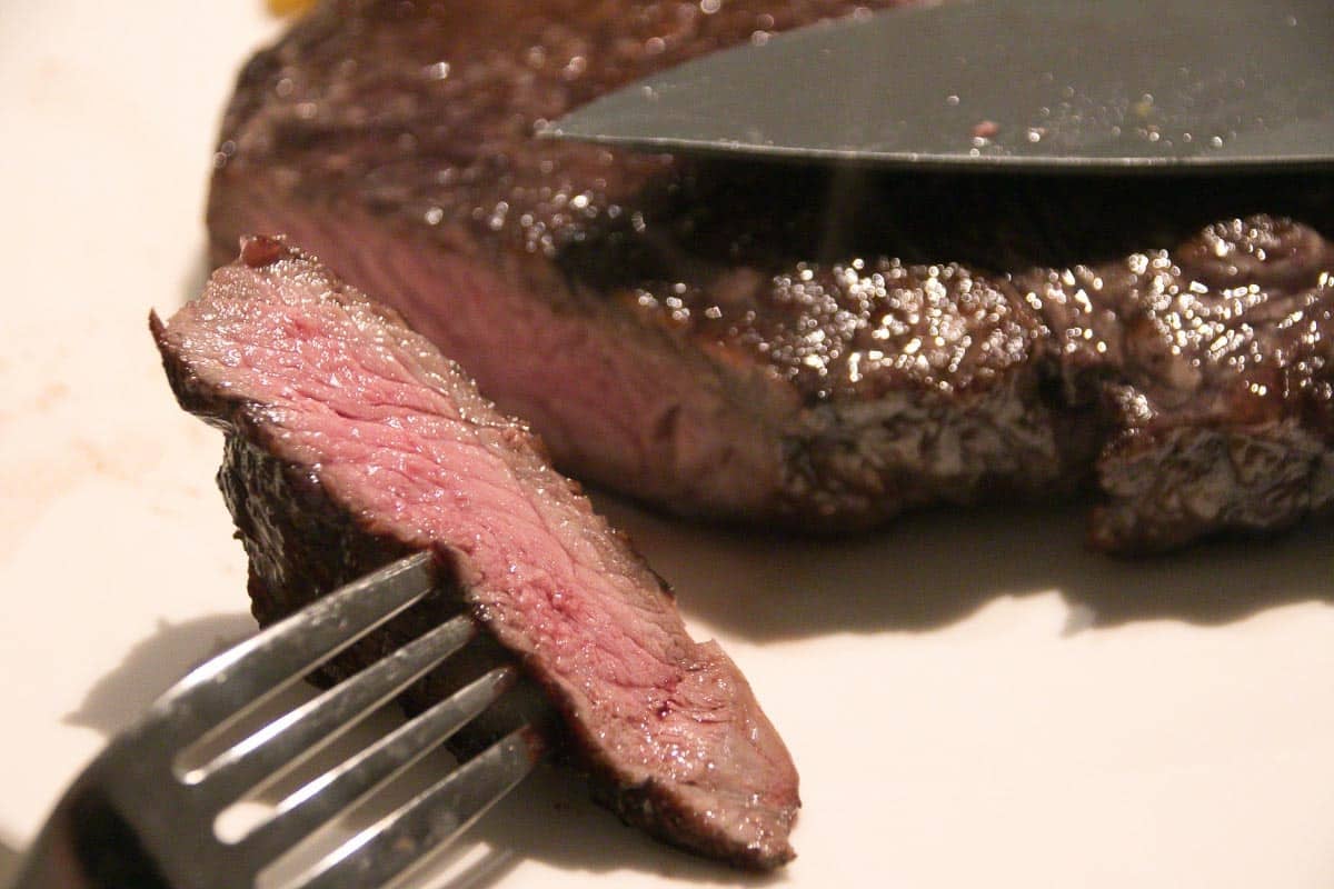 steak on fork.