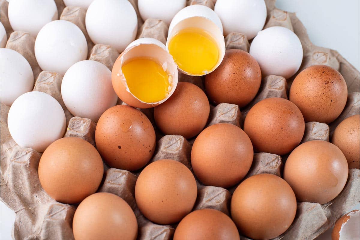 white and brown eggs.