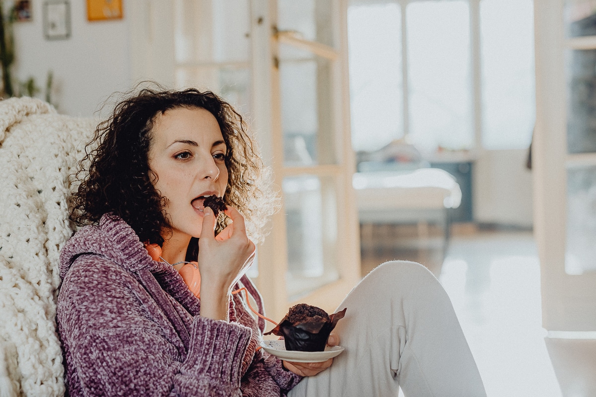woman eating a treat.