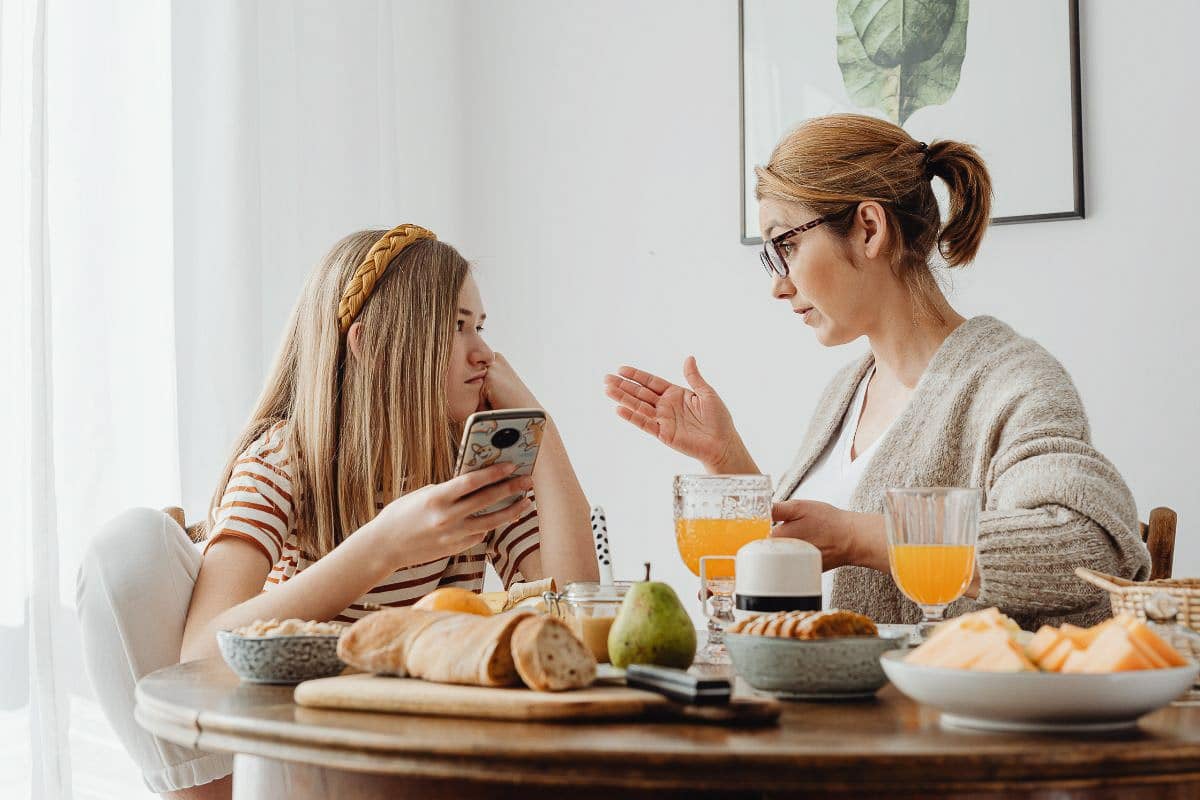 Mom lecturing girl.