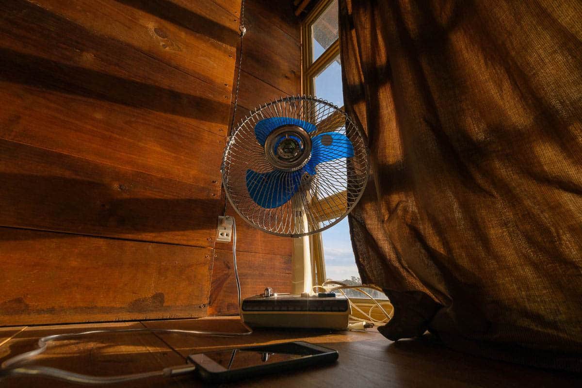 fan in front of window.