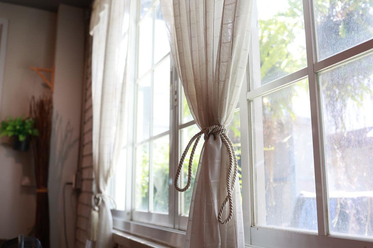 window with white curtains.