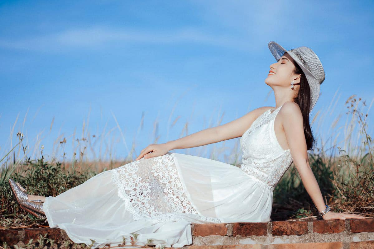 woman in white sundress.
